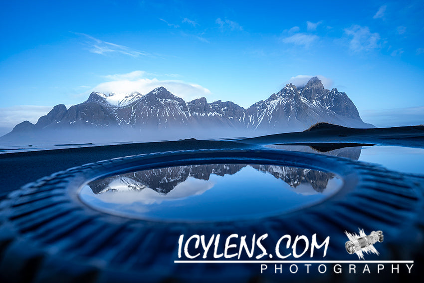 Vestrahorn reflected in the water on an old Tire